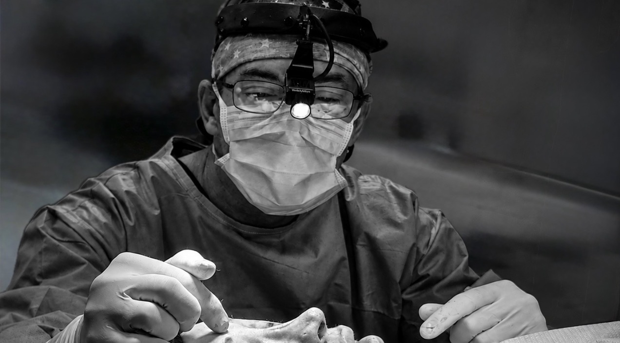 Dr. Prendiville concentrating during a procedure in the operating room